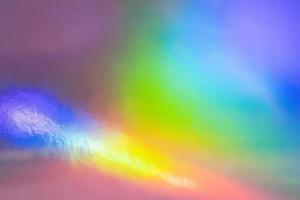 um fundo de folha holográfica iridescente cores pastel foto