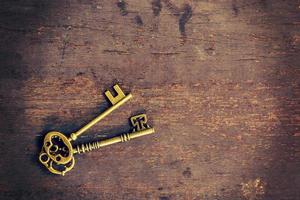 velho chave em madeira fundo com espaço foto