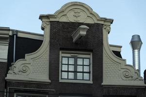 detalhe do gancho do prédio do centro da cidade de amsterdã foto