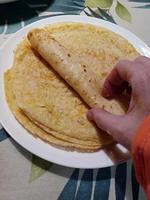 delicioso crepes ou frixuelos, tradicional sobremesa dentro carnaval foto