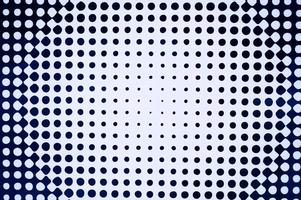 a textura de um fundo branco com círculos pretos de diferentes tamanhos foto