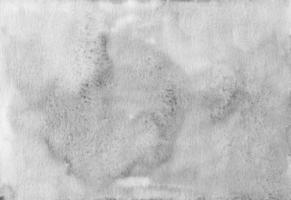 textura de fundo cinza claro em aquarela. manchas cinzentas na sobreposição de papel. foto