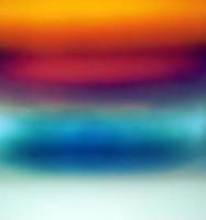álcool tequila dourado com azul, roxo, tonalidade gradiente de cor de fundo de textura abstrata foto