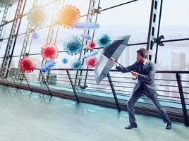 homem de negocios com guarda-chuva cobre ele mesmo a partir de bactérias. conceito do solução para Pare vírus contaminação e pandemia foto