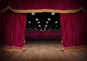 a vermelho cortinas estão abertura para a teatro mostrar foto