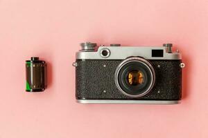 vintage filme foto Câmera lente e filme lista em Rosa pastel na moda fundo