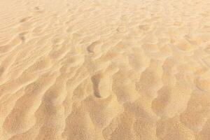 areia de praia fundo e textura padronizar com espaço. foto