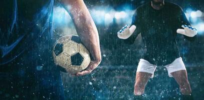 futebol cena às noite Combine com fechar acima do uma futebol atacante segurando a bola contra a opondo-se goleiro foto