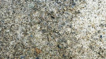 cascalho chão com rude cinzento cor superfície foto