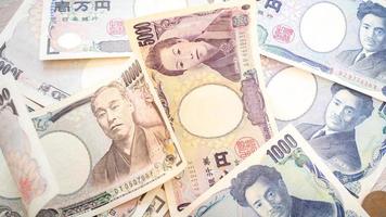 muitos do a japonês iene banco notas moeda. foto