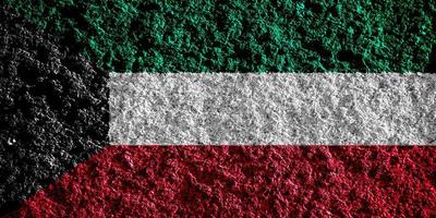 bandeira do Kuwait em uma texturizado fundo. conceito colagem. foto