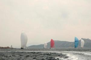 Sardenha, setembro 2005 - participantes dentro a maxi iate rolex copo barco raça foto