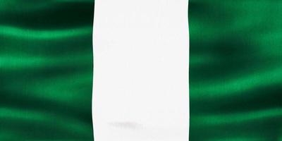 ilustração 3D de uma bandeira da Nigéria - bandeira de tecido acenando realista foto