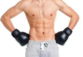 esporte homem vestindo boxe luvas em a branco foto