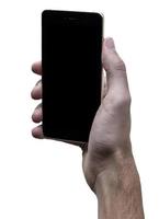 masculino mão segurando Preto celular com Preto tela às isolado branco fundo. foto