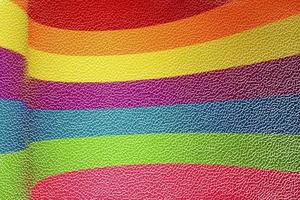 multicolorido iridescente curvado listras em papel texturizado papel de parede. brilhante e alegre fundo. foto