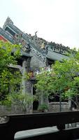 a velho chinês escola edifícios localizado dentro Guangzhou cidade do a China com a lindo pedra e de madeira escultura foto