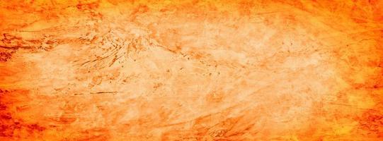 fundo de parede de textura de cimento laranja grunge foto