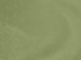 verde matcha olor veludo tecido textura usava Como fundo. esvaziar verde tecido fundo do suave e suave têxtil material. lá é espaço para texto. foto