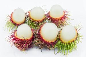 rambutã, uma fruta com doce gosto e vermelho peludo Concha foto