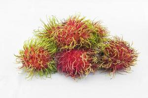 rambutã, uma fruta com doce gosto e vermelho peludo Concha foto