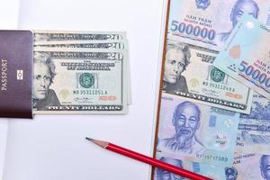 Vietnã e nos dólar moeda, caderno e Passaporte foto