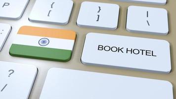 livro hotel dentro Índia com local na rede Internet on-line. botão em computador teclado. viagem conceito 3d animação. livro hotel texto e nacional bandeira. 3d ilustração foto