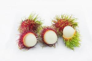 rambutã, uma fruta com doce gosto e vermelho peludo Concha foto