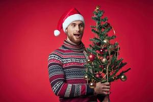 emocional homem Natal árvore brinquedos decoração estúdio estilo de vida foto