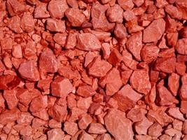 close-up de pedra vermelha ou parede de rocha para plano de fundo ou textura