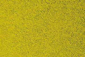 fechar acima do amarelo asfalto estrada textura fundo foto