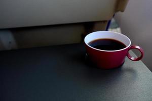 copo do café servindo em a voo. foto