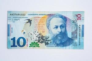 10 georgiano lari nota de banco. a nacional moeda do geórgia foto