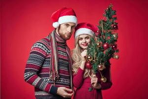 alegre jovem casal feriado Natal decoração romance foto
