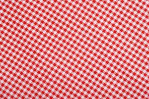 vermelho branco xadrez toalha de mesa fundo foto