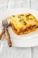 moussaka Berinjela batata Sediada prato foto