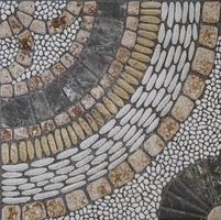 mosaico de pedras antigas formando figuras foto