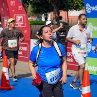 Novo Délhi, Índia - marcha 16 2023 - vedanta Délhi metade maratona raça depois de cobiçado dentro que maratona participantes sobre para Cruz a terminar linha, Délhi metade maratona 2022 foto