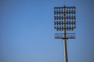 Grilo estádio inundar luzes postes às Délhi, Índia, Grilo estádio luzes foto