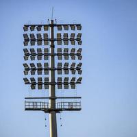 Grilo estádio inundar luzes postes às Délhi, Índia, Grilo estádio luzes foto