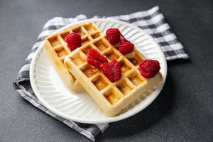 waffles Belga ou americano waffles café da manhã ou doce sobremesa refeição Comida lanche em a mesa cópia de espaço Comida fundo rústico topo Visão foto