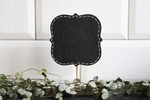 quadro-negro placa brincar com branco azulejos foto