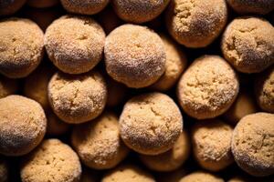 doce biscoitos dentro a forma do uma bola borrifado com em pó açúcar em uma de madeira fundo. generativo ai foto