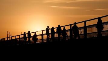 silhuetas pessoas caminhando em a ponte em pôr do sol fundo generativo ai foto