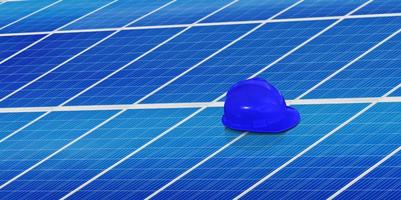 eletricista chapéu colocada em uma solar célula plano manutenção conceito solar energia limpar \ limpo energia foto