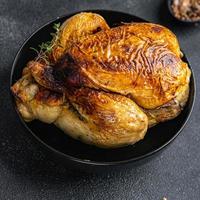 frango carne cozido aves de capoeira refeição Comida lanche em a mesa cópia de espaço Comida fundo rústico topo Visão foto