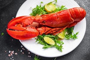 lagosta frutos do mar refeição Comida lanche em a mesa cópia de espaço Comida fundo rústico topo Visão foto