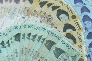 moeda do Coréia que é usava para representar valor dentro troca e a Ganhou é a a Principal moeda do coreano pessoas. coreano Ganhou notas para dinheiro conceito fundo. foto