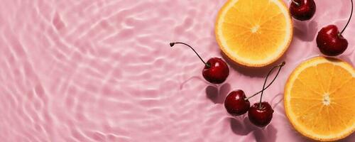 laranjas e cerejas dentro Rosa água bandeira com concêntrico círculos e ondulações. refrescante verão conceito, cópia de espaço foto