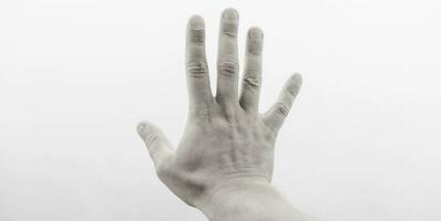 mão mostrando cinco dedos foto